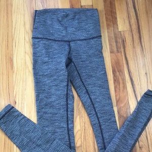 Lululemon size 4 high waisted legging.  Black/white houndstooth